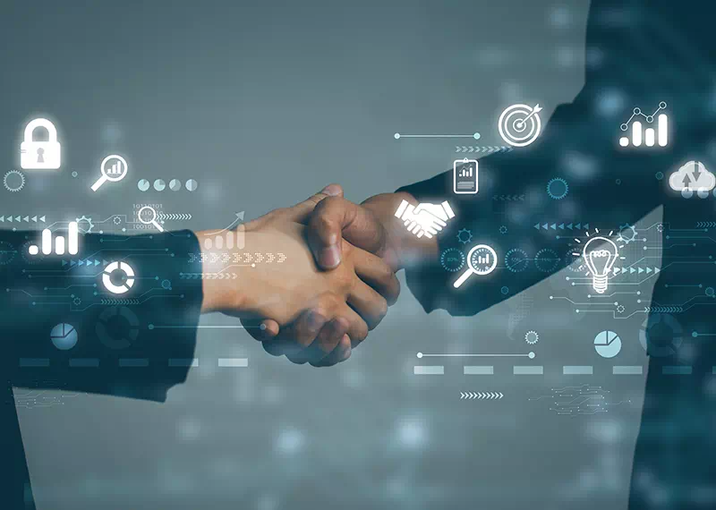 Stretta di mano per servizi outsourcing laboratorio